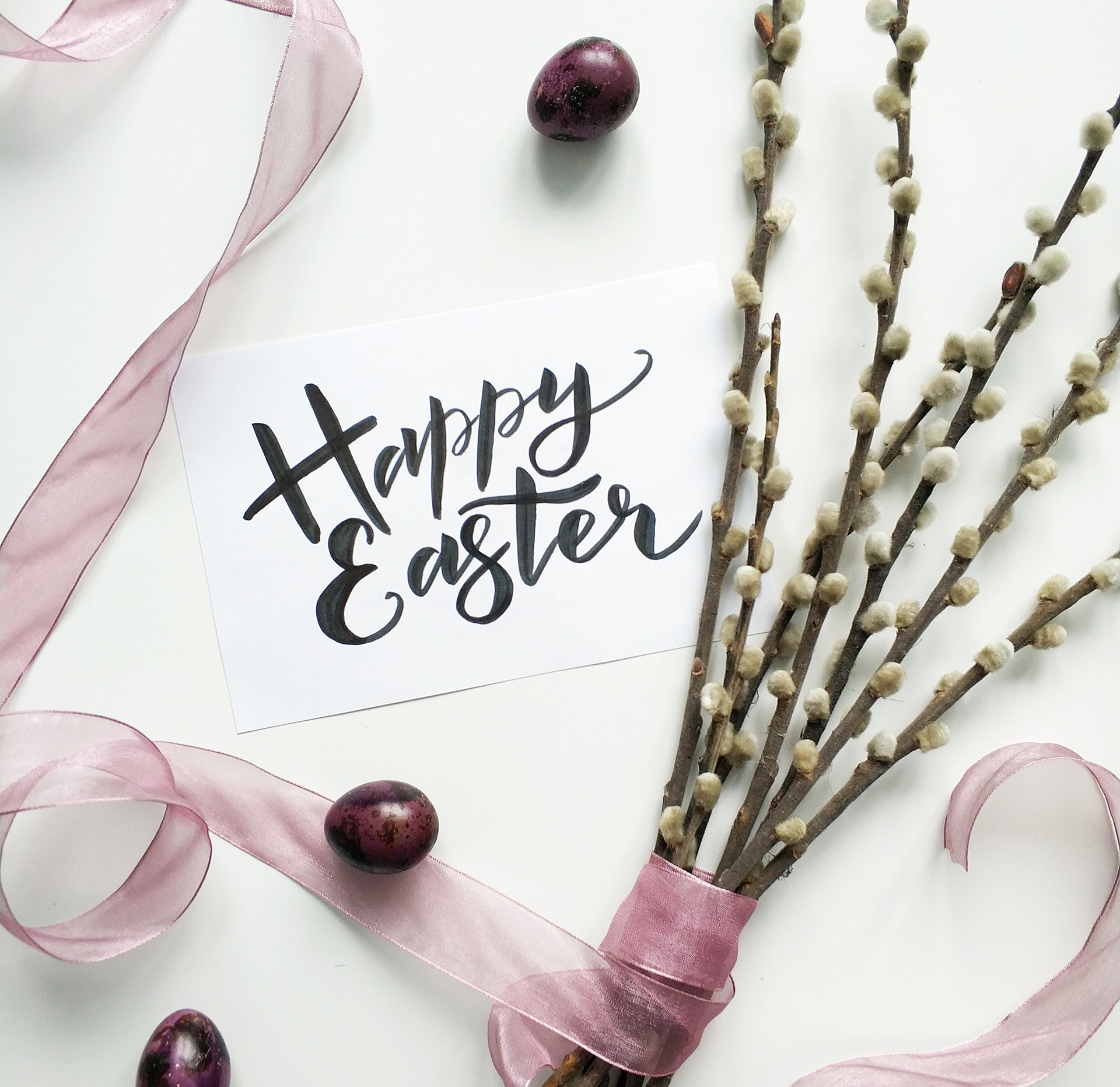 Happy Easter with flowers and ribbon