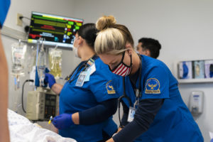 Nursing students work together during a simulation exercise at the School of Nursing at Hallmark University
