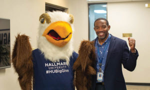 Dr. Henry with mascot